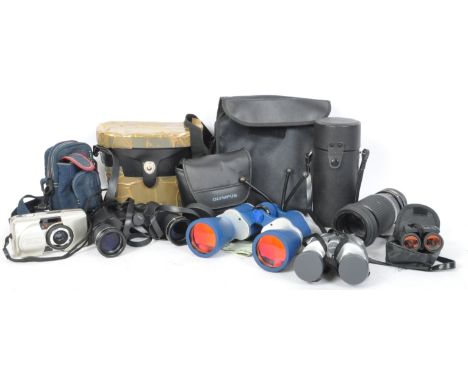 A collection of vintage telephoto lens, cameras and binoculars. To include, Olympus zoom 115, I R Vision digital optics lazer