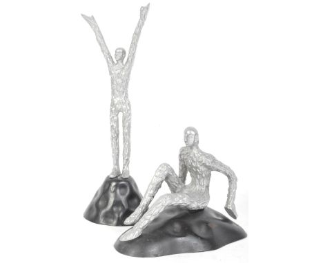 A pair of retro vintage 20th Century metal sculpture abstract human figurines on ebonised bases. Tallest measures 33cm.&nbsp;