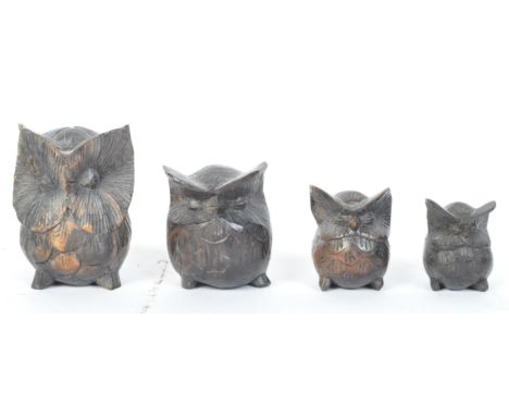 A collection of vintage 20th Century hand carved oak wood Owl ornaments / figurines. A family of scops owls. Measures approx.