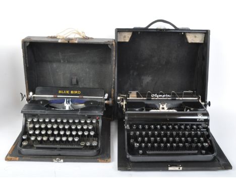 Two vintage 20th century cased typewriters to include an Olympia and a Blue Bird. Measures 15cm x 33cm x 31cm.&nbsp;