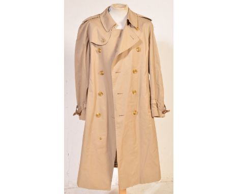 Burberry - A 20th century vintage Gents Burberry beige trench coat jacket having&nbsp;notched lapel collar, buttoned epaulett