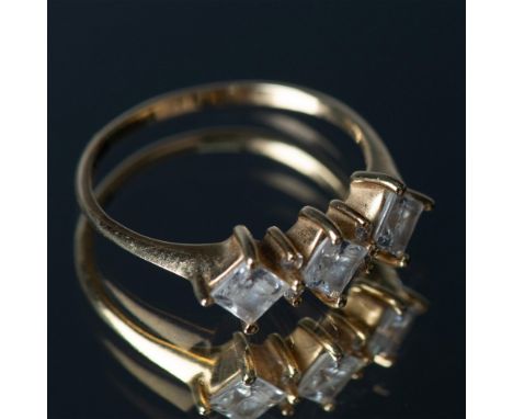 This beautiful ring features yellow gold set with CZ stones. Marked 14k inside the band. Size 9. Dimensions: See DescriptionC