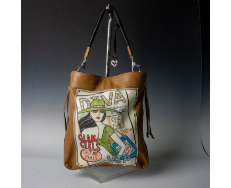 Black leather back and tan leather front with VIP fashion themed picture. 2 straps included, one black leather, one canvas. M