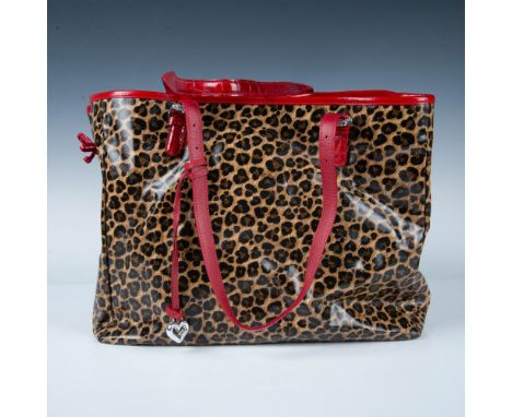 Oversized bag with adjustable red hand or shoulder straps. Leopard print offsets the red leather trim. Interior is red fabric