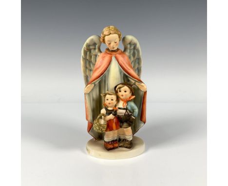 A hand painted figure of an angel wearing a red robe protecting a boy and girl. M.I. Hummel impressed. Goebel backstamp. Issu