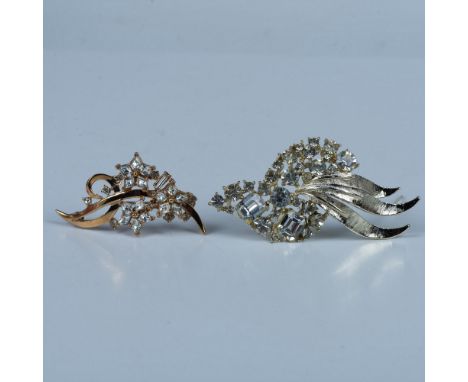 Two brooches with inset stones - starburst design in gold toned metal pin 2" and 3" pin in light metal setting with multiple 