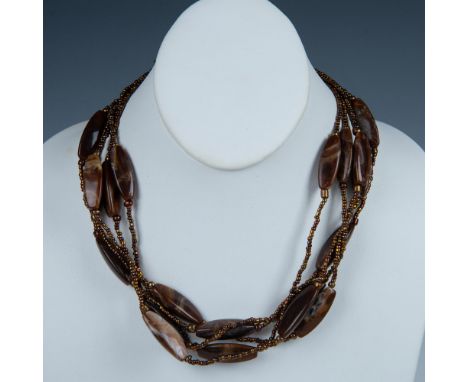 This beautiful 5-strand necklace has large brown marbled Lucite beads and small bronze tone beads with a gold metal clasp and