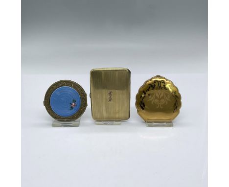 Shell shaped Elgin American compact with floral scroll on outer lid, mirror on inner lid and a pop-open section for face powd