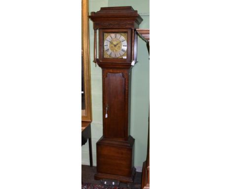 An oak eight day longcase clock, dial bearing a later inscription John Taylor, Manchester 