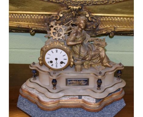 A late 19th century French gilot spelter mantel clock of railway interest together with a stand.