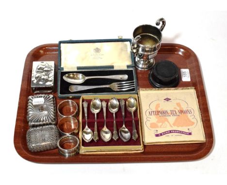 A collection of silver including, a small trophy cup, by Barker Brothers Silver Ltd., Birmingham, 1929, on ebonised wood base