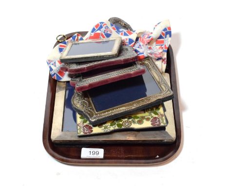 Six silver and silver-plated photo frames, enamel frame, alarm clock, barometer, miniature and French 1940's patriotic silk s