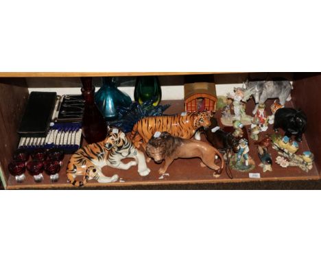 A group of ceramics including Beswick Tiger, model No. 2096; Beswick Lion, model No. 2554B; Beswick small birds; Russian and 