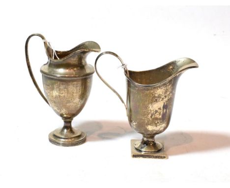 Two similar George V silver cream-jugs, both Sheffield, 1924, one by Mappin and Webb, the other by Henry Wigfull, each taperi