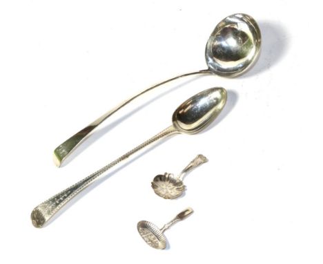 A George III silver soup ladle; a basting spoon; and two caddy spoons 