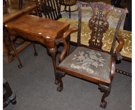 A 20th century walnut card table; together with a finely carved carver