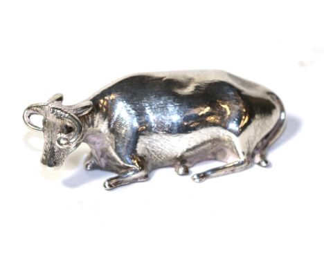 A William IV silver model of a recumbent cow, Henry Wilkinson &amp; Co, Sheffield, 1833, 7cm long
