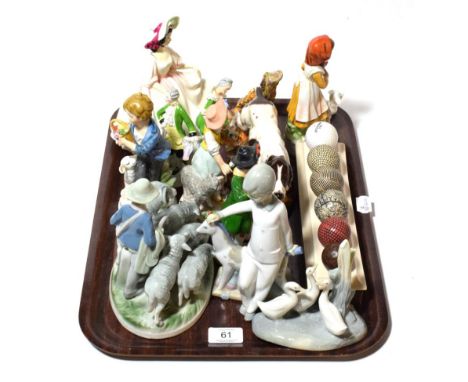 A collection of ceramic models and figures to include Royal Doulton Sunday Best figure, together with model of an English Poi