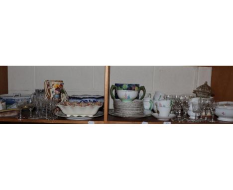 Decorative pottery including pottery tazza, tea wares, Poole jug; together with Majolica dish, glassware etc (two shelves)