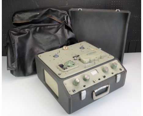 A Ferrograph Model 633 reel to reel tape recorder, with two reels of tape, 