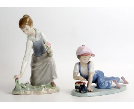 A Lladro figure 'All Aboard' 18cm long, and 'Flower Girl, 21cm high, both boxed. 