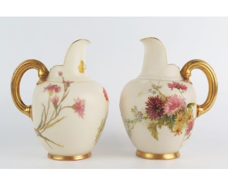 Two Royal Worcester blush ivory cream jugs with 1094 painted summer flowers decoration, puce marks, gilded handles, each13cm 