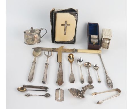 A silver mounted Book of Common Prayer with ivorine boards, silver mustard pot, napkin ring, caddy spoon, silver and plated f