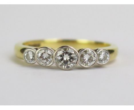An 18ct Gold Five Stone Diamond Ring, 4mm principal stone, hallmarked, size O.75, 3.79g gross 