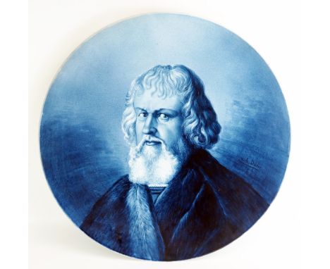 A large Villeroy &amp; Boch charger decorated with a portrait of Albrect Durer, 56cm diameter. 