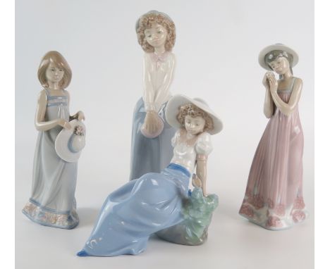 Lladro and Nao, four assorted porcelain figurines of young girls including seated girl with bird. (4) 
