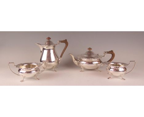 A George V silver four piece tea service, maker William Suckling Ltd, Birmingham, 1935/36, with reeded wavy edge border, rais