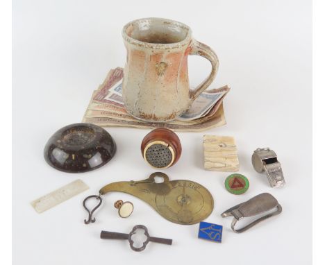A 19th century treen and metal nutmeg grater, a small serpentine dish, brass postage balance scales, studio mug etc. 