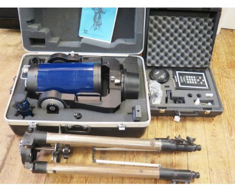 A Meade LX200 8" Schmidt-Cassegrain telescope, contained in a fitted case with accessories, instruction manual, together with