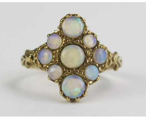 A 9ct Gold and Opal Nine Stone Marquis Shaped Ring, hallmarked, 18x15mm head, size S.5, 4.2g 