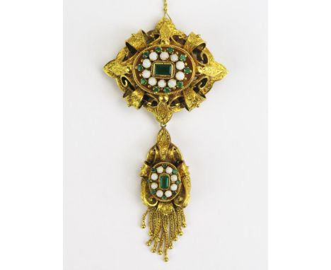 An 18ct Gold, Emerald and Opal Brooch with detachable pendant which can be worn as a necklace with fine chased decoration in 