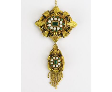 An 18ct Gold, Emerald and Opal Brooch with detachable pendant which can be worn as a necklace with fine chased decoration in 