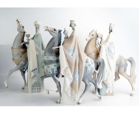 Lladro porcelain Three Wise Men on horseback, matt finish, each 41cm high. (3). One horse's leg damaged