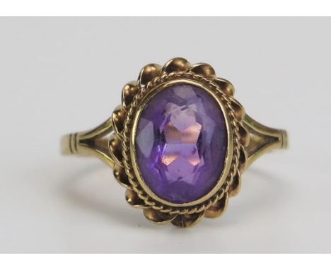 A 9ct Gold and Amethyst Ring, hallmarked, size I, 2.2g 