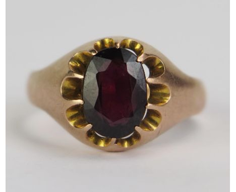 An Antique 9ct Gold and Garnet Ring, 10x7mm stone, Birmingham 1913, size S, 4.45g gross 