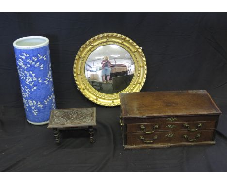 An elm wheel-back elbow chair with solid seat on turned under-framing, A Regency giltwood circular convex wall mirror, 56cm d