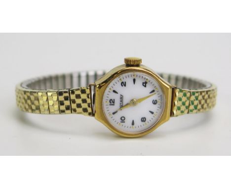 A ROTARY 9ct Gold Ladies Wristwatch with a gold plated bracelet, Manual wind movement. Running 