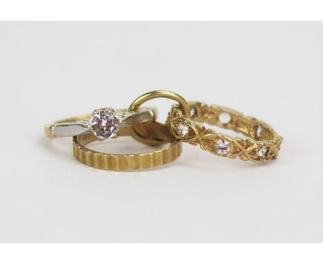 A 9ct Gold Charm of an engagement ring, wedding band and eternity ring, stamped 375, 2.54g 