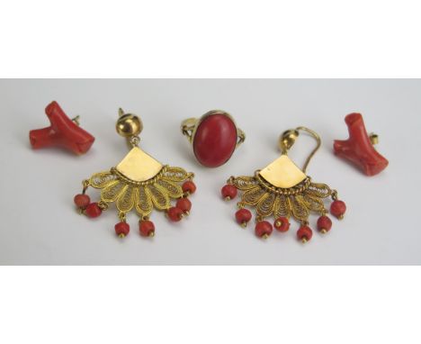 A Pair of Precious Yellow Metal Filigree and Coral Earrings (44mm drop, KEE tested as 15ct, 8.61g), a coral ring in a preciou