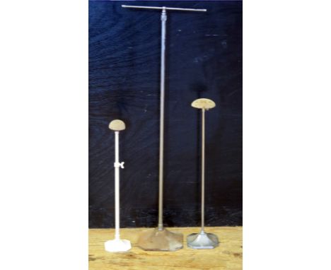Two vintage adjustable hat stands, together with an adjustable scarf stand. (3) 