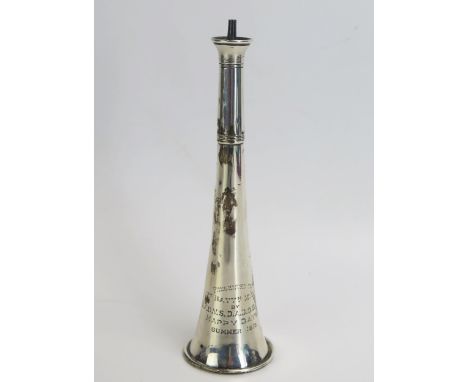 A George V silver table lighter, maker Goldsmiths &amp; Silversmiths Co Lt, London, 1918, inscribed, of inverted horn outline