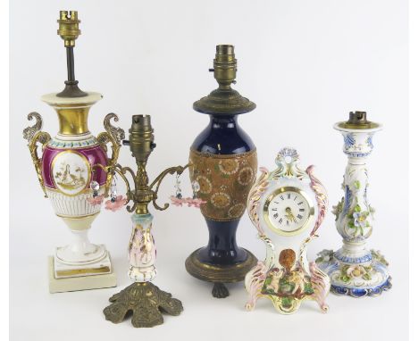 A Doulton vase converted to a table lamp, a pottery cased mantel timepiece and three other lamps. (5) 