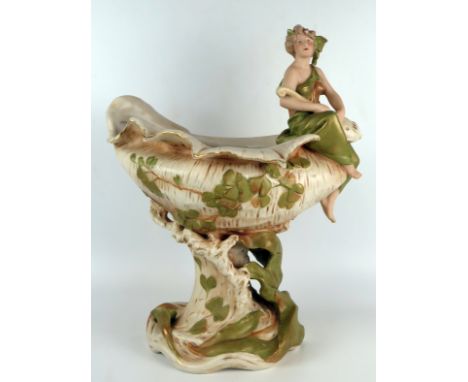 A large Royal Dux porcelain table centre-piece "Girl with lute on raised conch-shell", impressed marks 2062 to base, 45 cm hi