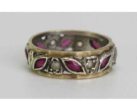 A 9ct Gold, Ruby and Diamond Eternity Ring, hallmarked, 6mm wide, size J, 2.81g 