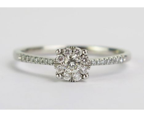 A Rox 18ct White Gold and Diamond Cluster Ring, size V.5, 3.63g gross 