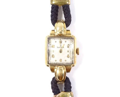 ROLEX - a lady's 18ct gold Precision mechanical wristwatch, champagne dial with gilt Arabic and dot hour markers and bevelled